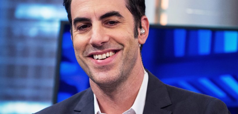 Sacha Baron Cohen's Fake Conspiracy Site Is Fully Post-Parody