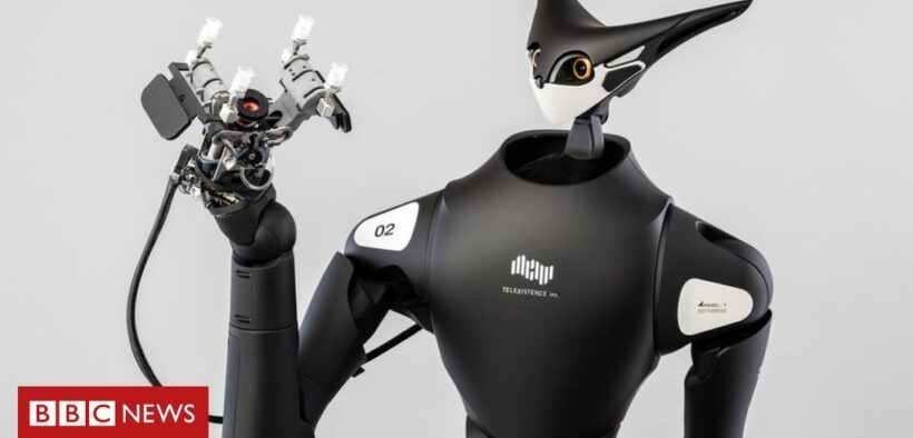 The robot shop worker controlled by a faraway human